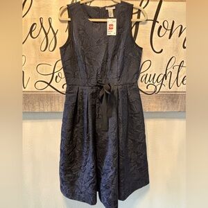 Navy Blue A-line dress with black tie ribbon around waist